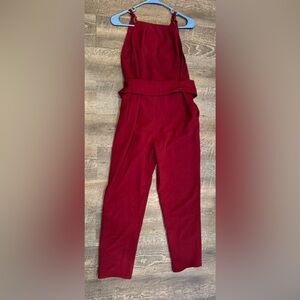 C.Luce Brand. Women’s size medium. Color is a burgundy/dark red.